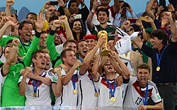 Müller (no. 13) celebrating with Germany after winning the 2014 FIFA World Cup