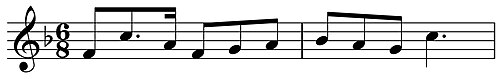 Musical notation showing a theme in F and in 6/8 time on a treble clef.