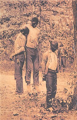 Bodies of three African-American men (Jim Redmond, Gus Roberson, and Bob Addison) lynched in Habersham County, Georgia, on May 17, 1892