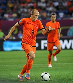Although naturally left-footed Arjen Robben (left, 11) has often been deployed as an inverted winger on the right flank throughout his career.