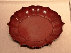 A Chinese six-pointed tray, red lacquer over wood, from the Song dynasty (960–1279), 12th–13th century, Metropolitan Museum of Art.