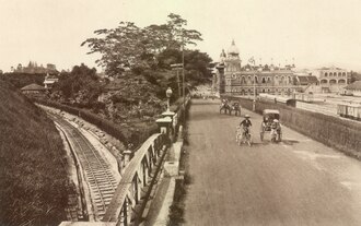 The construction of railway spurred the growth of the city. The first headquarters of the Federated Malay States Railways (now the National Textile Museum) near the F.M.S. Government Offices in the distance, c. 1910.