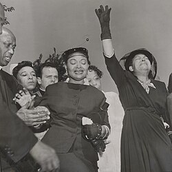 Emmett Till's mother, Mamie (middle), at her son's funeral in 1955. White men killed him after a white woman accused him of offending her in her family's grocery store.