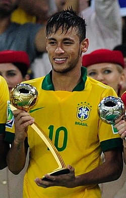 Neymar with the Golden Ball award for best player at the 2013 Confederations Cup