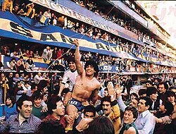 Maradona being held aloft Boca Juniors supporters after winning the 1981 Metropolitano title