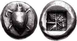 Silver stater of Aegina, 550–530 BC. Obverse: sea turtle with large pellets down centre. Reverse: incuse square punch with eight sections.