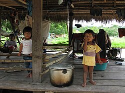 Two Asháninka children in their home in the Ucayali region