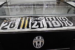 Zidane's Juventus jersey (center) at the Juventus Museum next to kits of (from left to right) Edgar Davids, Pavel Nedvěd, Roberto Baggio and Michel Platini