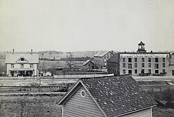 Early view of first Duke tobacco factory and family home, Durham, 1883