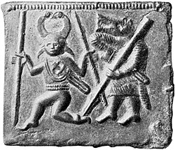 One of the Torslunda plates. The figure to the left was cast with both eyes, but afterwards the right eye was removed.[22]