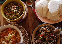 Three condiment relishes here accompany Nshima (top right)