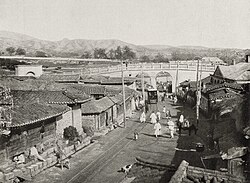 The overpass bridge leading to Gyeonghuigung.[111] Photo taken presumably just after the bridge's completion (late 1902 to mid 1903).[112]
