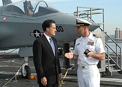 Governor Romney received a tour of the aircraft carrier USS John F. Kennedy on May 20, 2005, as part of celebrating Armed Forces Day.