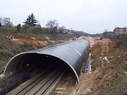 The Gerrards Cross tunnel in England, completed in 2010. Looking west towards the station in March 2005, showing the extent of construction three months before a small section collapsed.