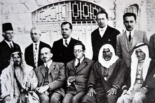 Chaim Weizmann (sitting, second from left) at a meeting with Arab leaders at the King David Hotel, Jerusalem, 1933. Also pictured are Haim Arlosoroff (sitting, center), Moshe Shertok (Sharett) (standing, right), and Yitzhak Ben-Zvi (standing, to Shertok's right).