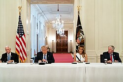 Parson (far right) at the White House in July 2020 with Vice President Mike Pence, President Donald Trump, and First Lady Melania Trump during an event encouraging school re-opening