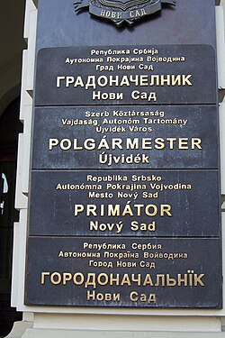 A multilingual sign outside the mayor's office in Novi Sad, Serbia, written in the four official languages of the city: Serbian, Hungarian, Slovak, and Pannonian Rusyn
