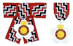 The badge of a Companion of the Queen's Service Order from the reign of Elizabeth II