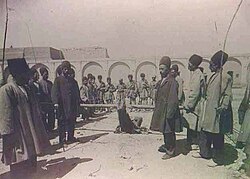 Foot whipping an offender, Persia, 1910s