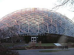 The Climatron greenhouse at the Missouri Botanical Garden simulates the climate of a rainforest for conservational and educational purposes.