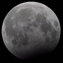 A calendrical "blue moon" during the December 2009 lunar eclipse
