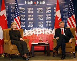 Canadian Prime Minister Stephen Harper (right) and U.S. Secretary of State Hillary Clinton (left) at the Haiti Ministerial Preparatory Conference addressing the humanitarian response to the 2010 Haiti earthquake relief efforts in Montreal, Canada.