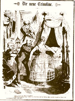 Cartoon on Bismarck's colonial policy: "The new crinoline." The caption reads: "Must I then participate in the fashion? – Have courage, good lady! Even if you are a bit embarrassed by the novel to start with, it will give you a brilliant appearance on the outside." At left in the background, the German Centrist Ludwig Windthorst is depicted as a governess. Engraving by Gustav Heil for the satirical magazine Berliner Wespen 13 March 1885
