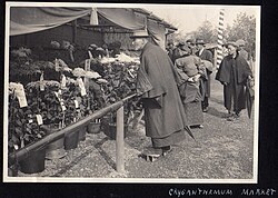 Men in the Inverness coat, Chrysanthemum Market in Japan, Taisho era (1914 by Elstner Hilton)