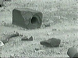 Image showing a graphite moderator block ejected from the core