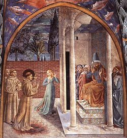 A fresco depicting three friars standing before a bearded and crowned man sitting on a throne surrounded by soldiers and bearded men