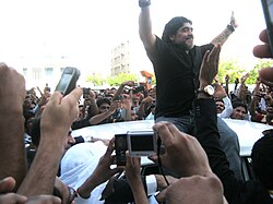 Maradona greeting fans after being appointed manager of Dubai club Al Wasl in June 2011