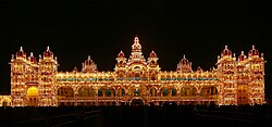Golden 5-storey Mysore Palace building with 21 domed towers and central spire
