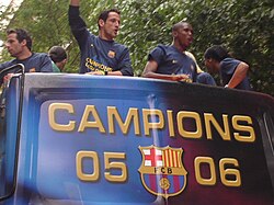 Eto'o and Juliano Belletti celebrate winning the 2005–06 La Liga with Barcelona