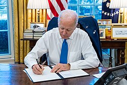 Joe Biden signing Executive Order 14065 in February 2022 in response to Russia's imminent invasion of Ukraine. The United States has given billions worth of military aid to Ukraine following the Russian invasion of the country in 2022.