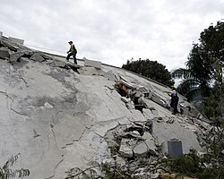 Urban Search and Rescue specialists work at the Hôtel Montana.