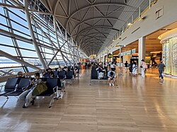 Second floor boarding lobby, within the longest airport terminal in the world