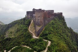 Citadelle Laferrière, built 1805–1822, is the largest fortress in the Americas, and is considered locally to be an eighth wonder of the world.[104]