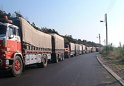 Trucks waiting in line after Syria closed its northern border with Lebanon following its withdrawal[26]