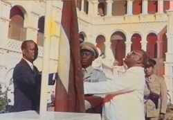 Sudan's flag raised at independence ceremony by Prime Minister Isma'il Alazhari and opposition leader Muhammad Ahmad Mahgoub on 1 January 1956