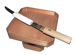 A tantō knife prepared for seppuku (abdomen-cutting)