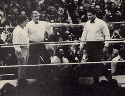 Ali (right) as a special guest referee along with Pat Patterson (middle) at WrestleMania I, with Liberace (left) as timekeeper