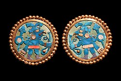 Moche earrings depicting warriors, made of turquoise and gold (1–800 CE)