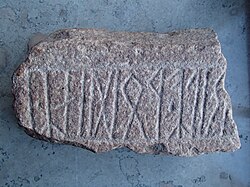 Woðinz (read from right to left), a probably authentic attestation of a pre-Viking Age form of Odin, on the Strängnäs stone
