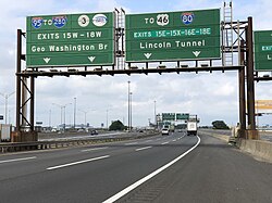 New Jersey Turnpike (I-95) northbound approaching split into Western Spur and Eastern Spur in Newark in 2020; these signs have since been removed and replaced with newer ones