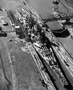 USS Missouri, one of the Iowa-class battleships, makes a very tight fit as she passes through the Miraflores Locks of the Panama Canal in October 1945.