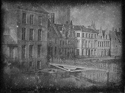 ‘View of the Predikherenlei and Predikherenbrug’ depicts the first photographic record of Ghent and in all probability Belgium. It dates back to October 1839, when optician François Braga arrived in Ghent with the daguerreotype camera. Together with his friend, seller of prints and engravings Joseph Pelizzaro, he took the picture on the second floor of judge Philippe Van de Velde's residence on the Ajuinlei. Of the four original plates they made, two plates are in the holdings of STAM – Ghent City Museum, while the two others are lost.