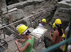 Archaeologists excavating in Rome, Italy