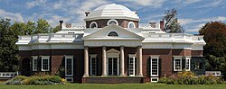 Plantations featuring the forced labor of large numbers of black slaves, such as Monticello owned by Thomas Jefferson, produced wealth for the white elite, the planter class.[341]