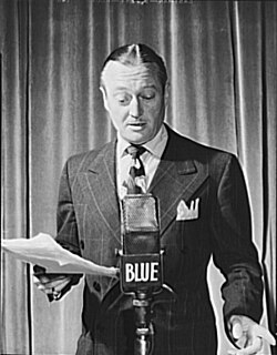 Edmund Lowe using a ribbon microphone in 1942