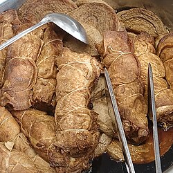 Chinese vegetarian chicken made of rolled tofu skin